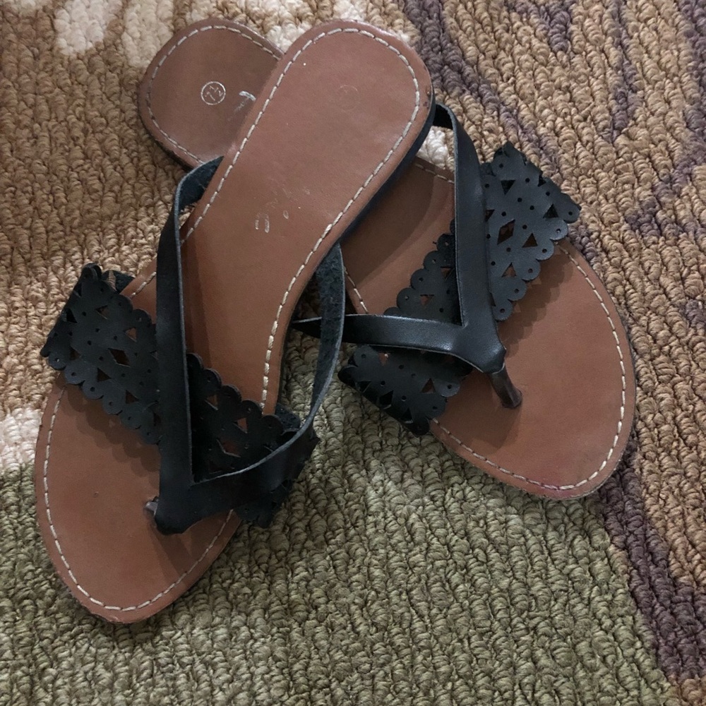 Brown and black sandals